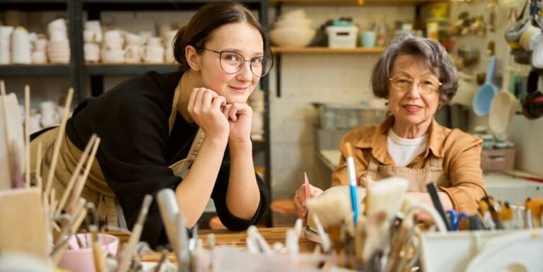 Elderly Woman Painting with Skilled Nurse at Assisted Living Facility